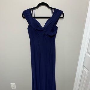 Formal off the shoulder floor length dress.